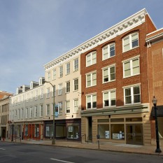 front exterior of restored mixed-use buildings