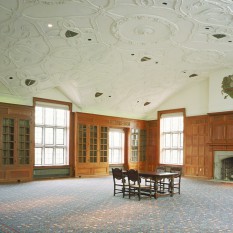 library with decorative plaster ceiling